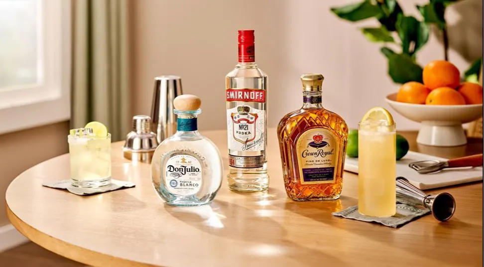Don Julio, Smirnoff and Crown Royal bottles with cocktails, from Voxly's marketing compliance AI agent pilot with Diageo