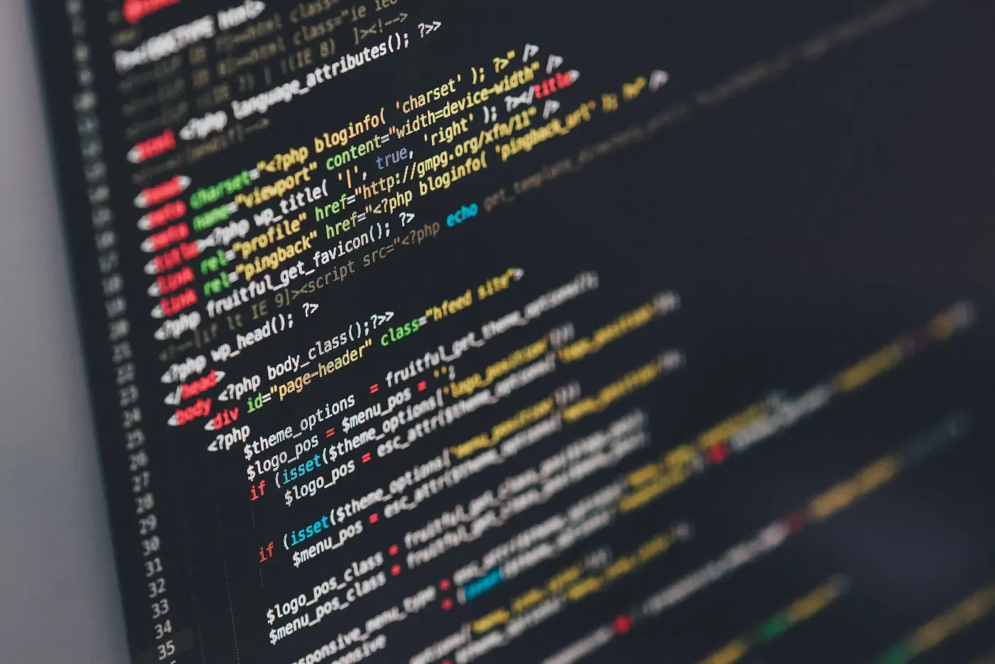 Code on a computer screen, illustrating crypto promotions that Voxly Vision checks against the FCA crypto rules