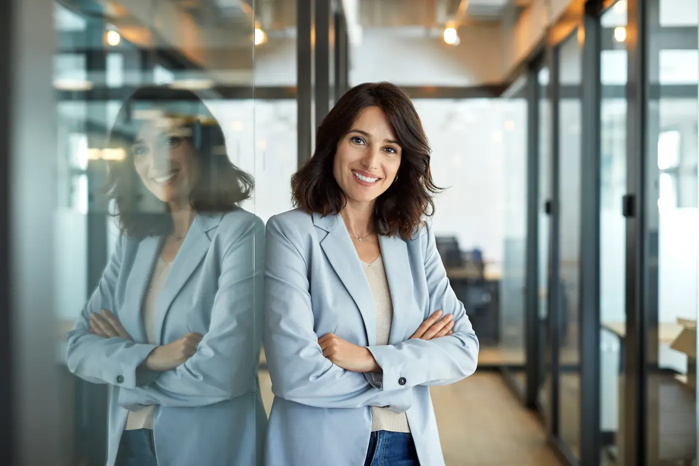 Confident businesswoman in a modern office, preparing vape marketing for the Tobacco and Vapes Act 2026 ad ban