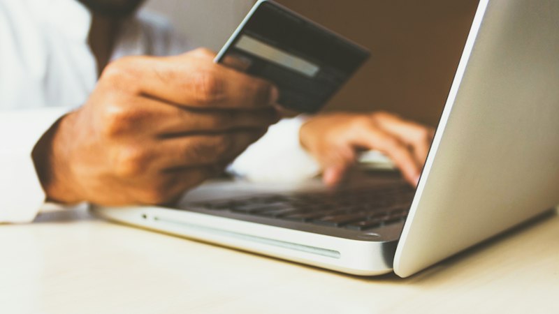 Shopper paying online with a card, where DMCC Act drip pricing rules apply